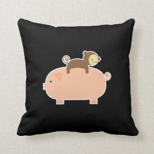 Baby Monkey Riding on a Pig Cushion