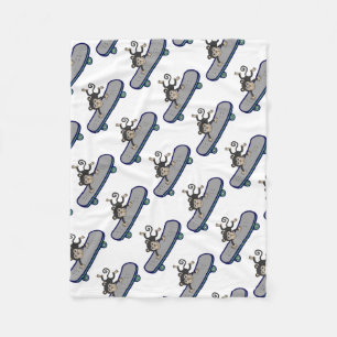 baby Monkey  riding skateboards Fleece Blanket