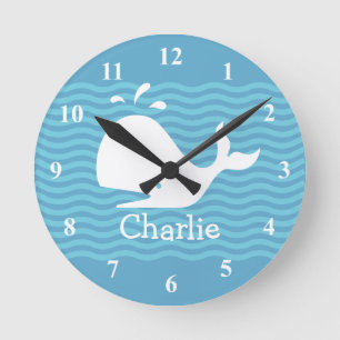 Baby name wall clock with cute whale in wavey sea