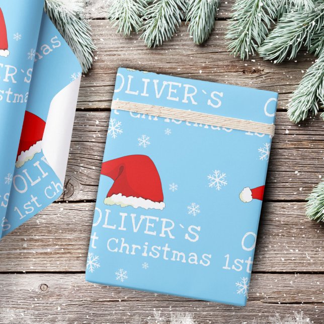 Baby`s First Christmas Blue Santa Hat Snowflake Wrapping Paper (Creator Uploaded)