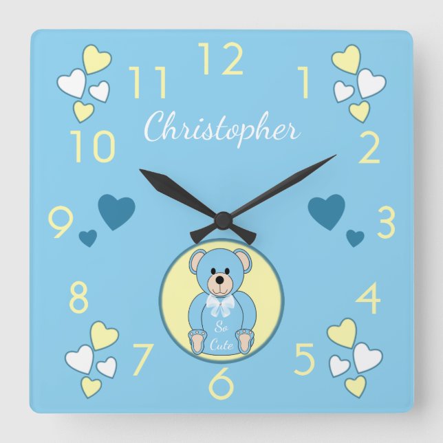 Baby teddy bear blue with love hearts and a name square wall clock (Front)