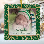 Babys 1st Christmas Photo Green Gold Foliage Ceramic Ornament<br><div class="desc">Celebrate baby's first Christmas with this beautiful keepsake ornament. Easily replace the sample image with your own favourite photo and customise it with baby's name in green script font and the year below. A white gradient screen helps make the text pop. The photo is set off by an elegant square...</div>