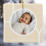 Baby's First Christmas Photo Cream Ceramic Ornament<br><div class="desc">This stylish Baby's First Christmas Photo Ornament is decorated with the word JOY in modern typography on a champagne-coloured background.
Easily customisable with your photo,  name,  and year.
Makes a special gift for grandparents,  aunts,  and uncles.</div>