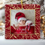 Babys First Christmas Photo Gold Foliage Red Ceramic Ornament<br><div class="desc">Celebrate baby's first Christmas with this beautiful keepsake ornament. Easily replace the sample image with your own favorite photo and customize it with baby's name in white script font and the year below. (The design works best with photos that have a dark background in the lower area.) The photo is...</div>