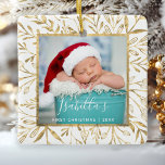 Babys First Christmas Photo Gold Foliage White Ceramic Ornament<br><div class="desc">Celebrate baby's first Christmas with this beautiful keepsake ornament. Easily replace the sample image with your own favorite photo and customize it with baby's name in white handwriting font and the year below. (The design works best with photos that have a dark background in the lower area.) The photo is...</div>