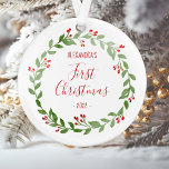 Baby's First Christmas Photo Wreath Red Text Ornament<br><div class="desc">This design features a watercolor Christmas wreath surrounding your baby's name,  "First Christmas, " and the year in whimsical red printing and handwriting fonts. Customise the reverse side with a favourite photo of your baby,  encircled by the same wreath.</div>