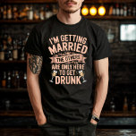 Bachelor Party Drinking Team Groom Design T-Shirt<br><div class="desc">Get ready for the ultimate bachelor bash with this distressed vintage "I’m Getting Married,  The Others Are Only Here to Get Drunk" design. Perfect for the groom-to-be and his party squad,  it brings humour,  fun,  and bold style to your pre-wedding celebration.</div>