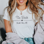 Bachelorette Party Team Bride Personalised Bridal T-Shirt<br><div class="desc">Introducing our Team Bride Personalised Bridal T-Shirt – the perfect blend of style, celebration, and personalisation for your unforgettable bachelorette party! Immerse yourself in the joy of being part of the bride squad with these specially crafted shirts that are as unique as your bond. Designed with a heart motif, these...</div>