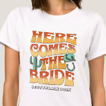 Bachelorette Party Western Cowboy Desert Groovy T-Shirt<br><div class="desc">Step into Adventure with this Desert Theme Bachelorette Party Custom T-Shirts! Embrace the allure of the desert as you embark on a one-of-a-kind bachelorette party. This exclusive collection of custom t-shirts captures the essence of the desert theme, infusing it with style and sophistication to create lasting memories of your bach...</div>