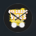 Back To School 4th Grade Vibes Shirt First Day Kid Round Clock<br><div class="desc">Back To School 4th Grade Vibes Shirt First Day Teacher Kids
4th, grade, shirt, gift, ideas, back to school, 2021, first day of school, gift idea, 4th grade, student, teacher, fourth grade, school fourth grade, 4th grade teacher, student, teaching, 4th grade squad, kids, gifts</div>