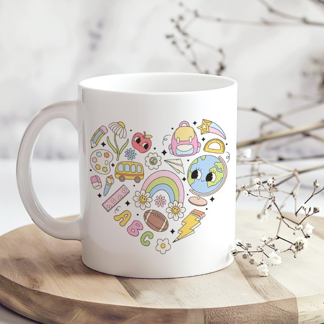 Back to School Groovy Colourful Heart Coffee Mug (Back to School Groovy Colorful Heart Coffee Mug on a boho kitchen table with tiny white flowers)