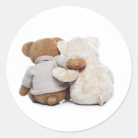 Back view of two Teddy bears hugging each other