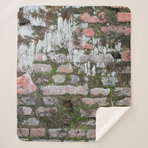 Background of old orange and grey bricks, part of sherpa blanket