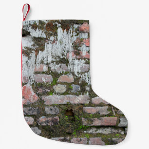 Background of old orange and grey bricks, part of small christmas stocking
