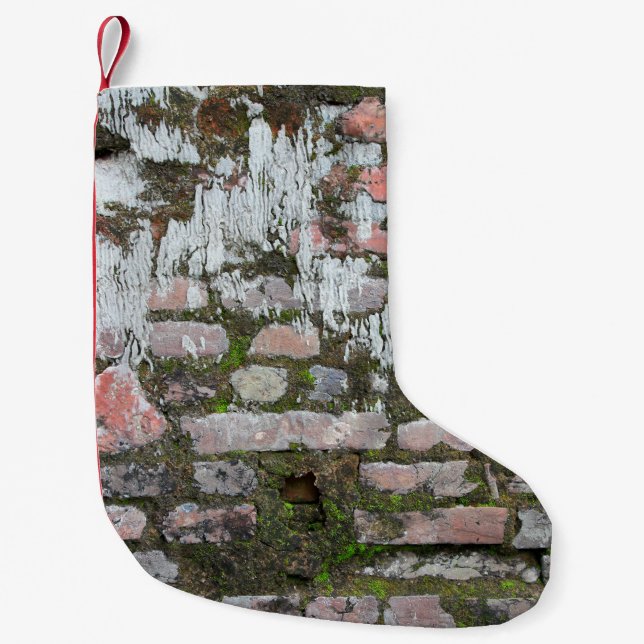 Background of old orange and grey bricks, part of  small christmas stocking (Front)