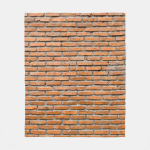 Background of old vintage brick wallaging, antique fleece blanket