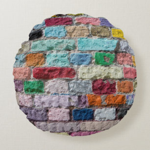 Background of painted colour brick wall texture round cushion