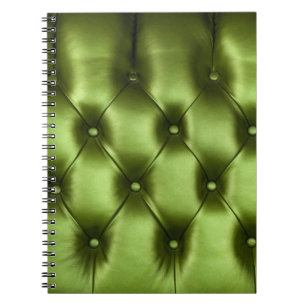 Background texture of dark green capitone genuine notebook