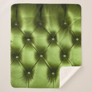 Background texture of dark green capitone genuine  sherpa blanket
