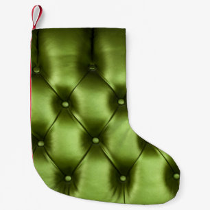 Background texture of dark green capitone genuine  small christmas stocking