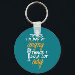 Bad At Singing Funny Karaoke Singer Artist Key Ring<br><div class="desc">I'm Bad At Singing Love To Sing. Funny design for those who love to sing on stage, in the shower, choir or musical, lead vocalist in music band. Cool humourous merchandise for musician, artist, singer songwriter and rock band member. Perfect for karaoke night and audition. Great Christmas gift and birthday...</div>