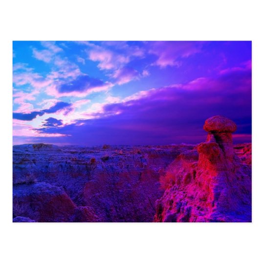 Badlands colorfull sky of blue and red postcard