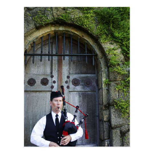 Bagpiper at Castle Postcard