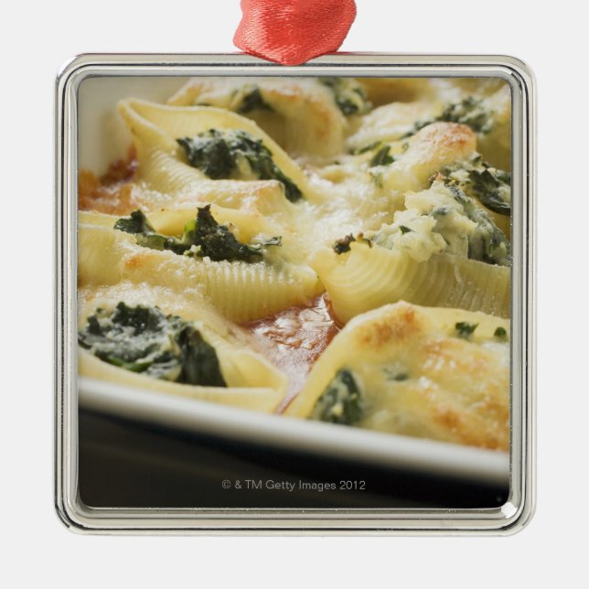 Baked pasta shells with spinach filling metal tree decoration (Front)