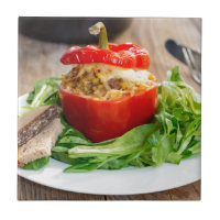 Baked stuffed peppers with meat sauce and cheese