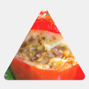 Baked stuffed peppers with meat sauce and cheese triangle sticker