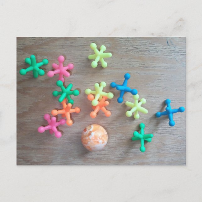 Ball with Colourful Jacks Tossed on Board  Postcard (Front)