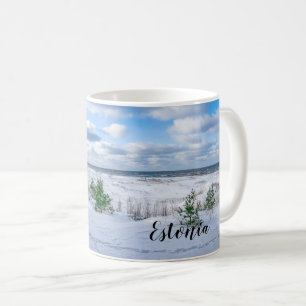 Baltic sea coast covered in snow in winter coffee mug