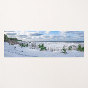 Baltic sea coast covered in snow in winter yoga mat