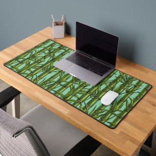 Bamboo forest on light blue desk mat
