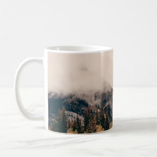 Banff national park foggy mountains and forest in  coffee mug