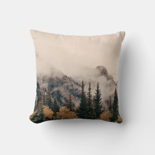 Banff national park foggy mountains and forest in  cushion