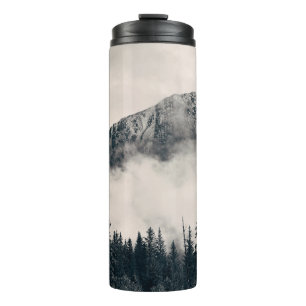 Banff national park foggy mountains and forest in thermal tumbler