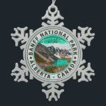 Banff National Park Moraine Lake Alberta Canada Snowflake Pewter Christmas Ornament<br><div class="desc">Banff National Park Moraine Lake Alberta Canada Ornaments. 
Banff National Park Canada Vintage design makes a great Christmas or Birthday gift for fans of Canadian National Park. This design is a perfect gift for skiing lovers in Canada Outdoors.</div>