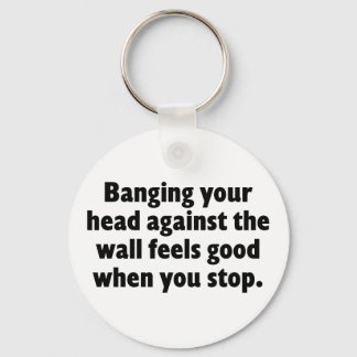 Banging your head against a brick wall key ring