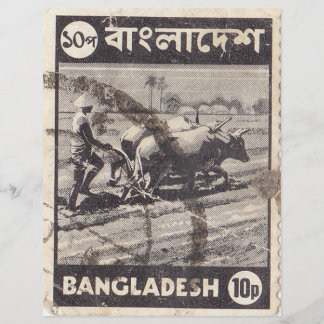 Bangladesh postage stamp  with a man and bulls