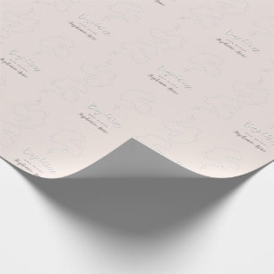Baptism Rosary on Pink Wrapping Paper