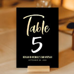 Bar Mitzvah Black Gold Script Modern Bold Elegant Table Number<br><div class="desc">No Bar Mitzvah party is complete without personalised table number cards. Let your son be proud, rejoice and celebrate his milestone at his perfectly coordinated party. Stunning, modern, bold gold faux foil handwritten script overlays a sophisticated, dramatic black background. Personalise the custom text with the table number, his name, and...</div>