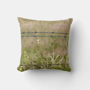 Barbed wire fence cushion