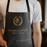 Barber name gold logo barber shop black leather apron<br><div class="desc">Personalised barbershop apron with faux gold scissors and laurel wreath logo (you can replace it with your own!) and with the barber's name and title over a black leather look background.           Perfect for a professional look.</div>