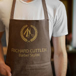 Barber name gold logo barber shop brown leather apron<br><div class="desc">Personalised barbershop apron with faux gold scissors and laurel wreath logo (you can replace it with your own!) and with the barber's name and title over a dark brown leather look background.           Perfect for a professional look.</div>