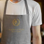 Barber name gold logo barber shop grey leather apron<br><div class="desc">Personalised barbershop apron with faux gold scissors and laurel wreath logo (you can replace it with your own!) and with the barber's name and title over a silver grey grey leather look (PRINTED,  NOT REAL LEATHER) background.           Perfect for a professional look.</div>
