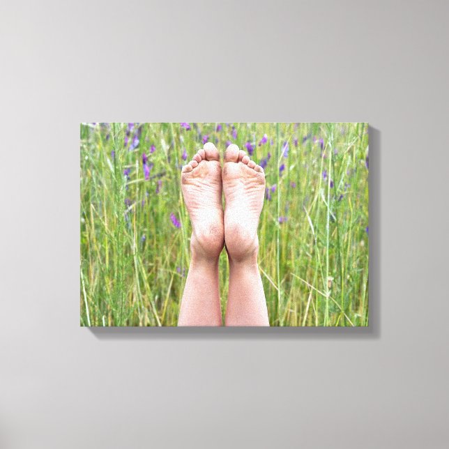 bare feet in meadow wildflowers canvas print (Front)