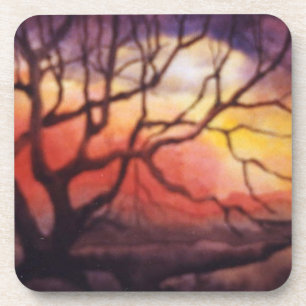 Bare winter tree and dramatic fiery sunset coaster