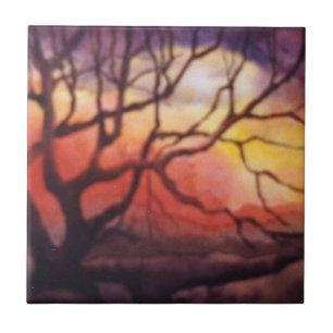 Bare winter tree and dramatic fiery sunset tile