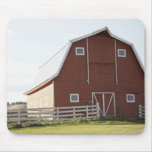 Barn in rural landscape mouse mat